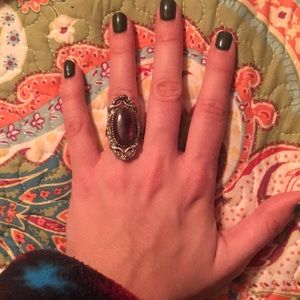 Ring with purple gem